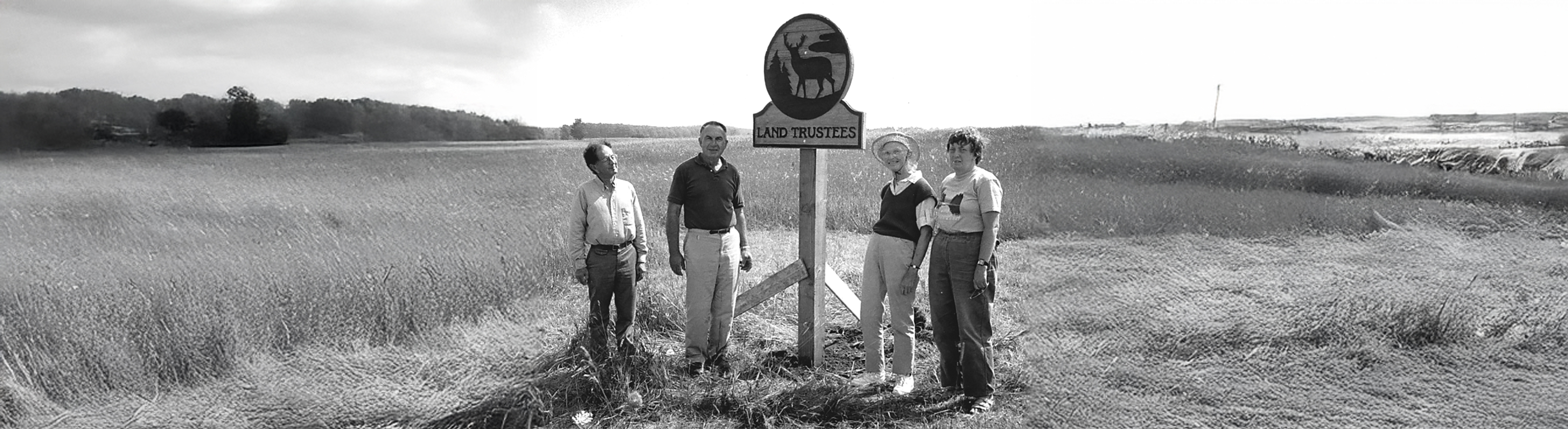 Ruth Neumann and fellow land trustees signing conservation agreement, 1986